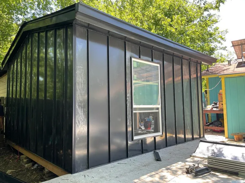 Black standing seam metal wall panels for Roof Inspection in Sandston